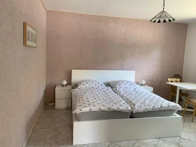 Ein Bett oder Betten in einem Zimmer der Unterkunft Ferienhaus mit Terrasse - 10 Minuten von Templin