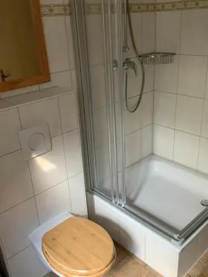Ein Badezimmer in der Unterkunft Lutki Dom