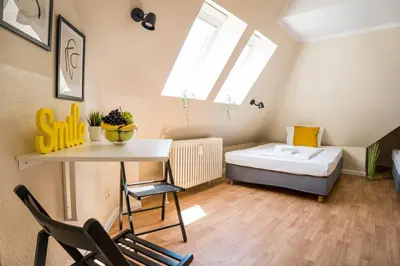Ein Bett oder Betten in einem Zimmer der Unterkunft Alte Feuerwache