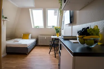 Ein Bett oder Betten in einem Zimmer der Unterkunft Alte Feuerwache
