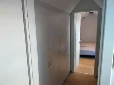 Ein Bett oder Betten in einem Zimmer der Unterkunft Ferienwohnung 