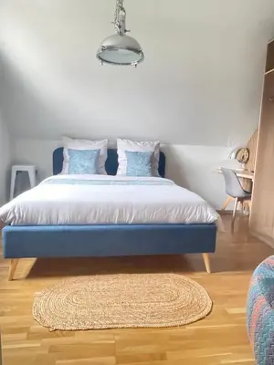 Ein Bett oder Betten in einem Zimmer der Unterkunft LikeHome gemütliches Privatzimmer im Haus, Hasenfelder Weg 15 in Heinersdorf