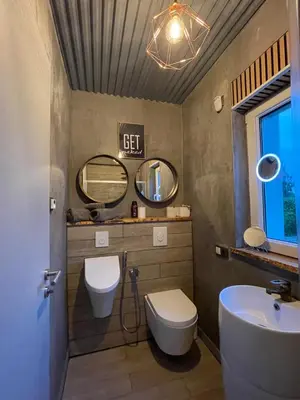 Ein Badezimmer in der Unterkunft LikeHome gemütliches Privatzimmer im Haus, Hasenfelder Weg 15 in Heinersdorf