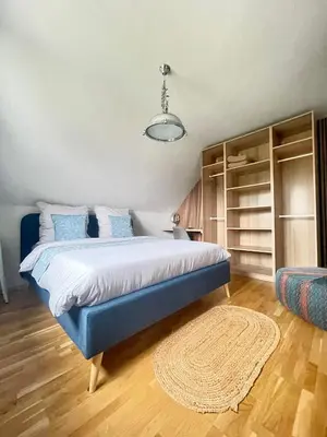 Ein Bett oder Betten in einem Zimmer der Unterkunft LikeHome gemütliches Privatzimmer im Haus, Hasenfelder Weg 15 in Heinersdorf