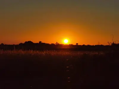 Blick auf den Sonnenuntergang/Sonnenaufgang von der Ferienwohnung aus oder aus der Nähe