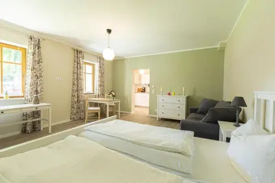 Ein Bett oder Betten in einem Zimmer der Unterkunft Ferienwohnungen Wildau am Werbellinsee