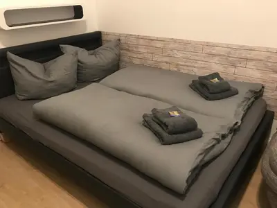 Ein Bett oder Betten in einem Zimmer der Unterkunft Pension Lotti Friedrichshain