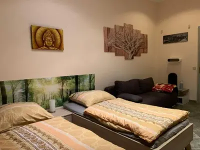 Ein Bett oder Betten in einem Zimmer der Unterkunft Pension Lotti Friedrichshain