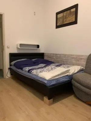 Ein Bett oder Betten in einem Zimmer der Unterkunft Pension Lotti Friedrichshain