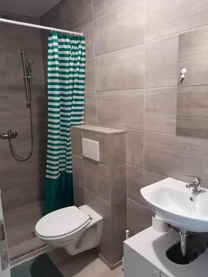 Ein Badezimmer in der Unterkunft Rema Ferienwohnungen