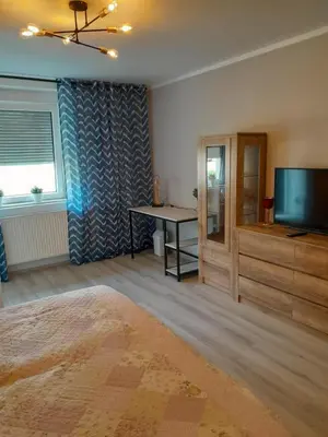 Ein Bett oder Betten in einem Zimmer der Unterkunft Rema Ferienwohnungen