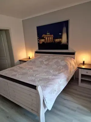 Ein Bett oder Betten in einem Zimmer der Unterkunft Rema Ferienwohnungen