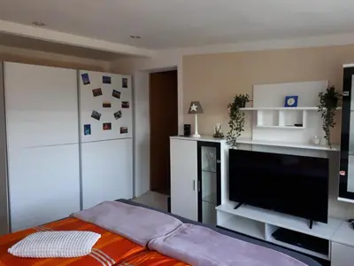 Ein Bett oder Betten in einem Zimmer der Unterkunft Dachstübchen an der Oder