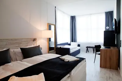 Ein Bett oder Betten in einem Zimmer der Unterkunft Catalonia Berlin Mitte