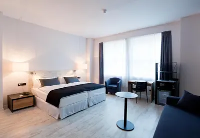 Ein Bett oder Betten in einem Zimmer der Unterkunft Catalonia Berlin Mitte