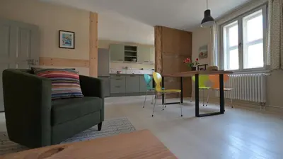 Ein Sitzbereich in der Unterkunft Ferienwohnung Rheinsberg Altstadt