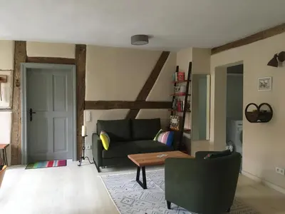 Ein Sitzbereich in der Unterkunft Ferienwohnung Rheinsberg Altstadt