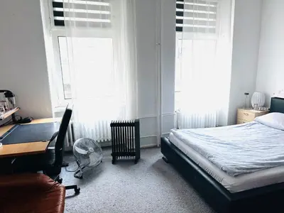 Ein Bett oder Betten in einem Zimmer der Unterkunft A cosy, super quiet room in Wedding