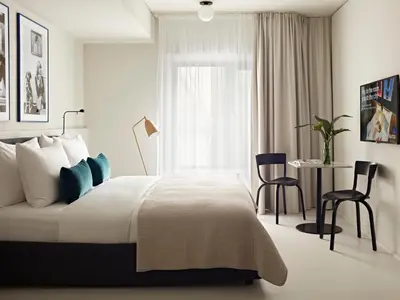 Ein Bett oder Betten in einem Zimmer der Unterkunft Numa Berlin Savi