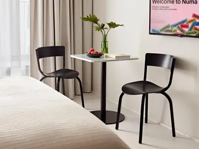 Ein Bett oder Betten in einem Zimmer der Unterkunft Numa Berlin Savi