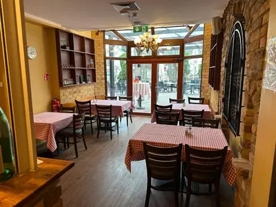 Ein Restaurant oder anderes Speiselokal in der Unterkunft Boutique Hotel Sena