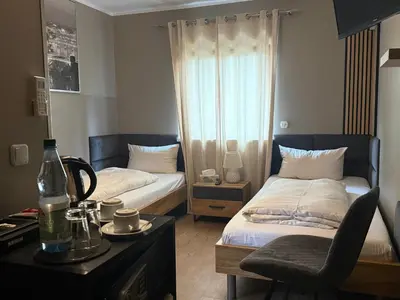 Ein Bett oder Betten in einem Zimmer der Unterkunft Boutique Hotel Sena