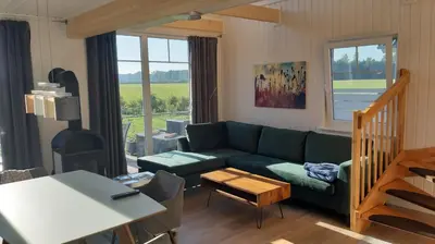 Ein Sitzbereich in der Unterkunft Ferienhaus Lotte