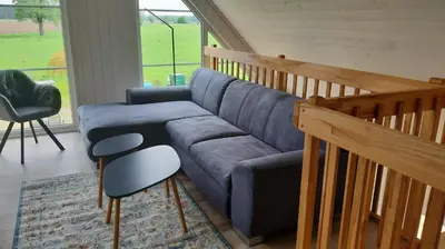 Ein Sitzbereich in der Unterkunft Ferienhaus Lotte