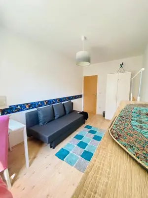 Ein Sitzbereich in der Unterkunft Schönes Zimmer im charmanten Haus