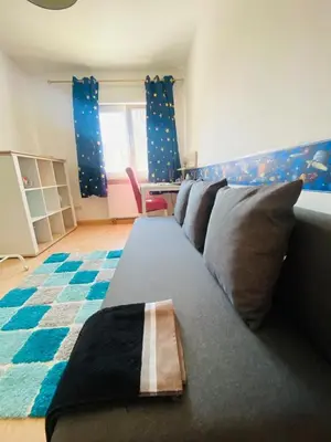Ein Sitzbereich in der Unterkunft Schönes Zimmer im charmanten Haus