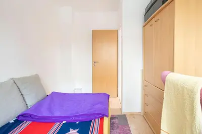Ein Bett oder Betten in einem Zimmer der Unterkunft Schönes Zimmer im charmanten Haus