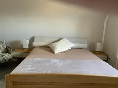 Ein Bett oder Betten in einem Zimmer der Unterkunft Schwalbennest