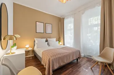 Ein Bett oder Betten in einem Zimmer der Unterkunft Holiday 33 Apartment I und N Mitte