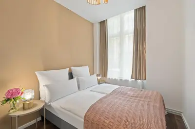 Ein Bett oder Betten in einem Zimmer der Unterkunft Holiday 33 Apartment I und N Mitte