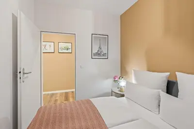 Ein Bett oder Betten in einem Zimmer der Unterkunft Holiday 33 Apartment I und N Mitte
