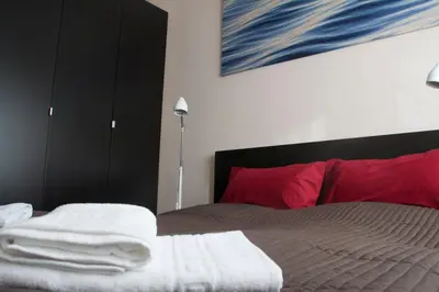 Ein Bett oder Betten in einem Zimmer der Unterkunft Villa Weißensee
