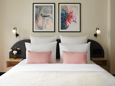 Ein Bett oder Betten in einem Zimmer der Unterkunft Numa Berlin Novela