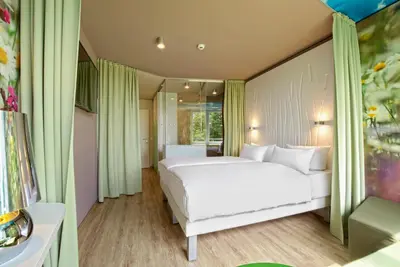 Ein Bett oder Betten in einem Zimmer der Unterkunft aja Bad Saarow