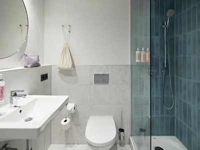Ein Badezimmer in der Unterkunft Numa Berlin Arc