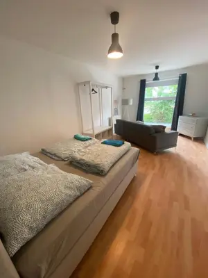 Ein Bett oder Betten in einem Zimmer der Unterkunft Osthafen II