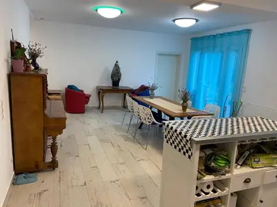 Ein Sitzbereich in der Unterkunft Villa DADA