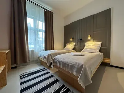 Ein Bett oder Betten in einem Zimmer der Unterkunft Schillinger-Berlin am Tempelhofer Feld