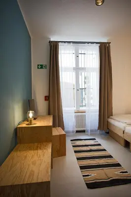 Ein Bett oder Betten in einem Zimmer der Unterkunft Schillinger-Berlin am Tempelhofer Feld