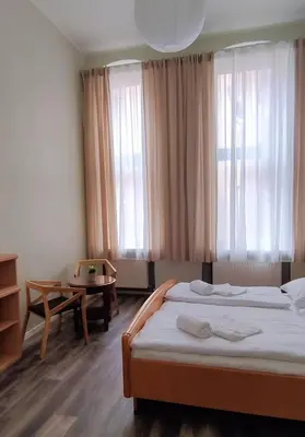 Ein Bett oder Betten in einem Zimmer der Unterkunft Pension I