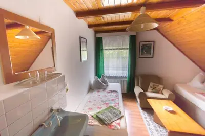 Ein Bett oder Betten in einem Zimmer der Unterkunft Pension Zum Taucher