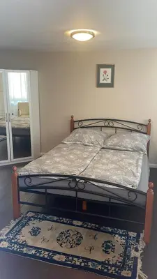 Ein Bett oder Betten in einem Zimmer der Unterkunft Haus Evelynchen Apartment 1 Deutschhof