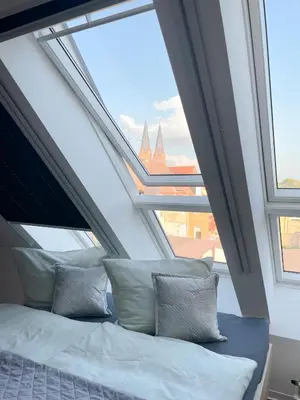 Ein Bett oder Betten in einem Zimmer der Unterkunft Ferienwohnung Kamrath mit wunderschönem Ausblick