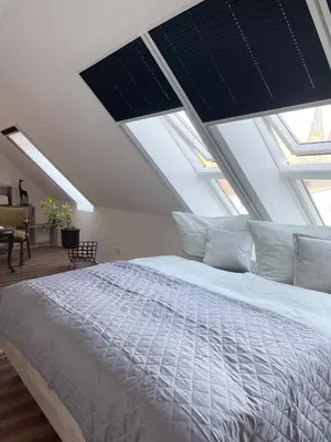 Ein Bett oder Betten in einem Zimmer der Unterkunft Ferienwohnung Kamrath mit wunderschönem Ausblick