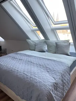 Ein Bett oder Betten in einem Zimmer der Unterkunft Ferienwohnung Kamrath mit wunderschönem Ausblick