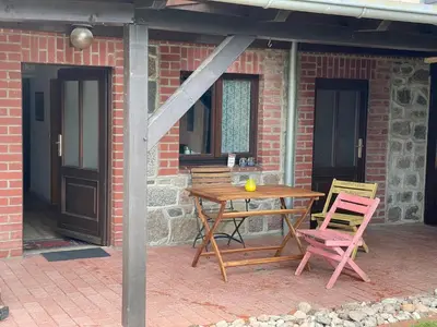 Ein Patio oder anderer Außenbereich in der Unterkunft Ferien direkt am Wasser